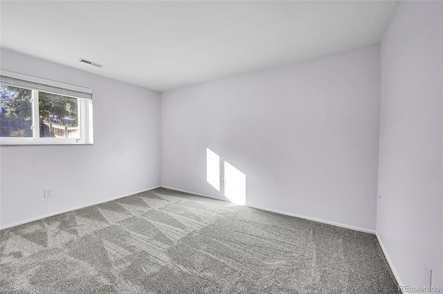 unfurnished room with carpet floors