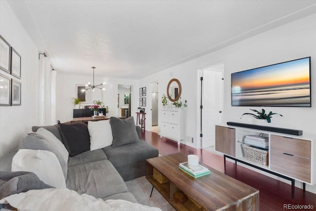 3929 Shoshone St, Denver, CO 80211 - living area with a chandelier and wood finished floors