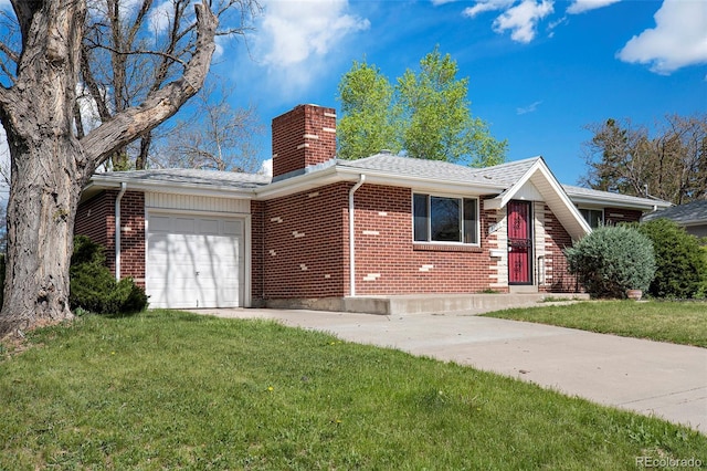 ranch-style home featuring a garage, a front lawn, a chimney, brick siding, and driveway