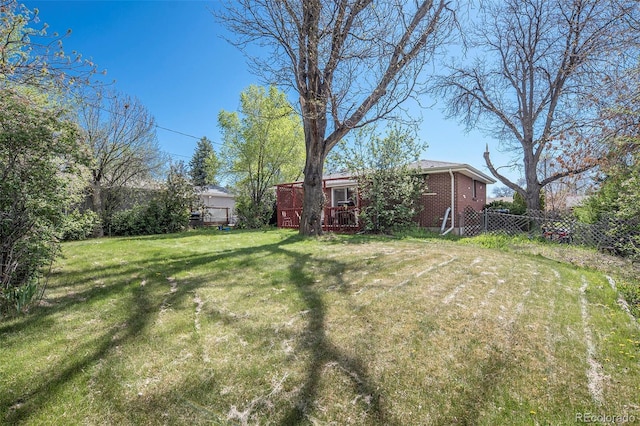 view of yard featuring fence
