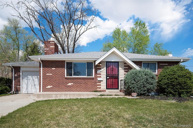 view of front of property featuring an attached garage, a front lawn, brick siding, a chimney, and driveway