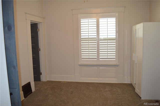 1215 10th Ave, Greeley, CO 80631 - spare room with carpet floors