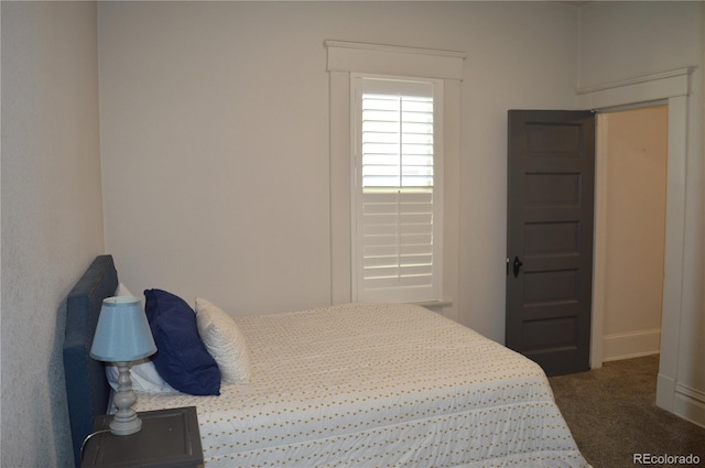 1215 10th Ave, Greeley, CO 80631 - bedroom with carpet floors and baseboards