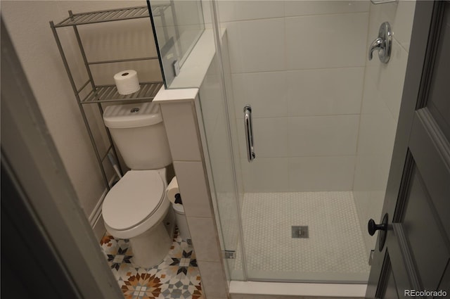 1215 10th Ave, Greeley, CO 80631 - full bathroom featuring a shower stall and tile patterned flooring