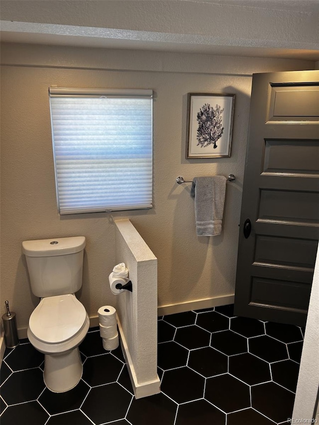 1215 10th Ave, Greeley, CO 80631 - half bathroom with toilet and baseboards
