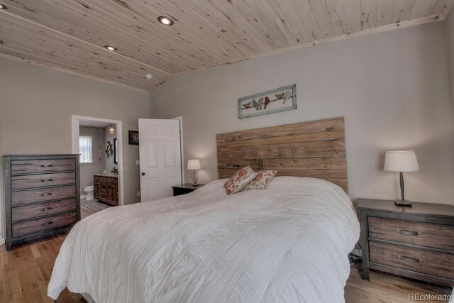 136 W Buckskin Rd, Alma, CO 80420 - bedroom with wood finished floors, wood ceiling, and ensuite bath