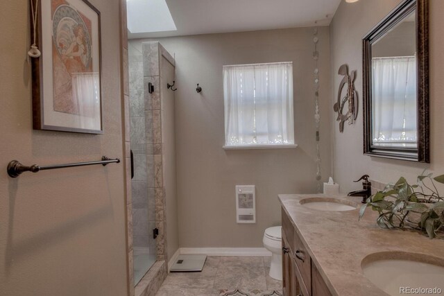 136 W Buckskin Rd, Alma, CO 80420 - bathroom with a tile shower, toilet, a sink, baseboards, and double vanity