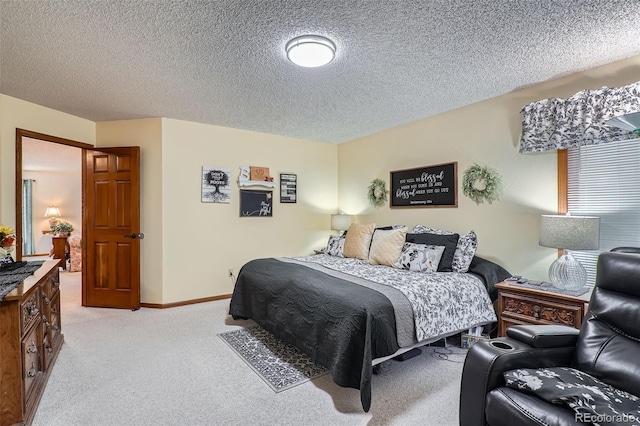 carpeted bedroom with a textured ceiling