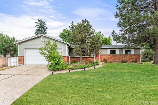 single story home featuring a front lawn and a garage