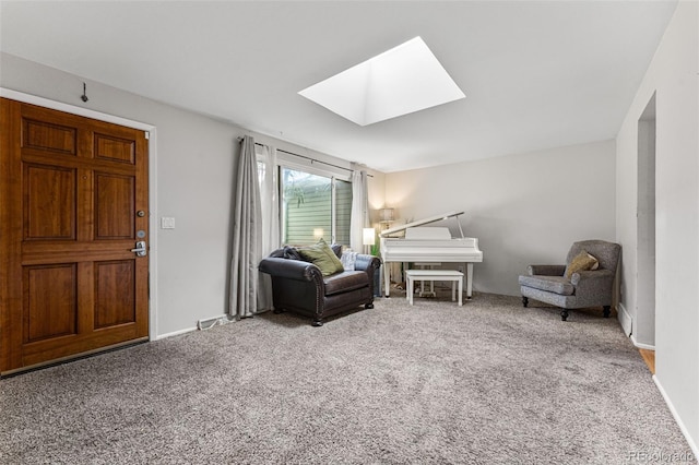 living area featuring a skylight and light colored carpet