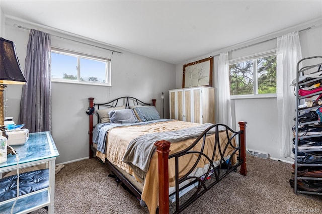 bedroom featuring carpet