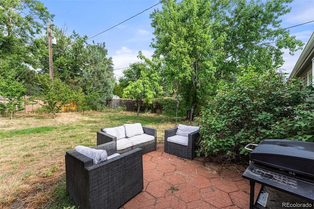 view of patio featuring area for grilling and an outdoor hangout area