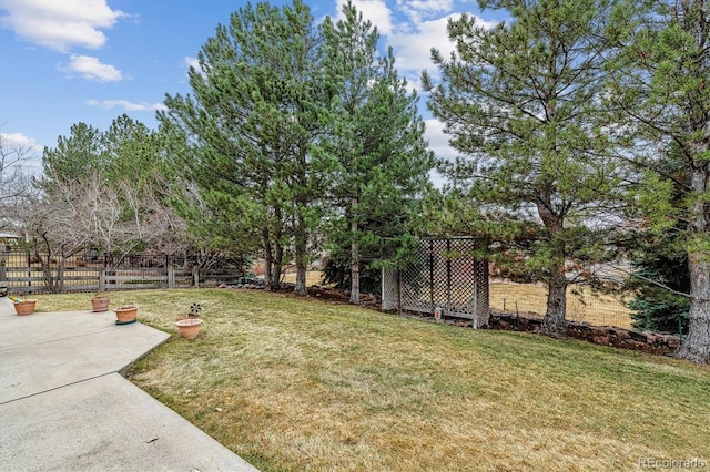 view of yard featuring fence