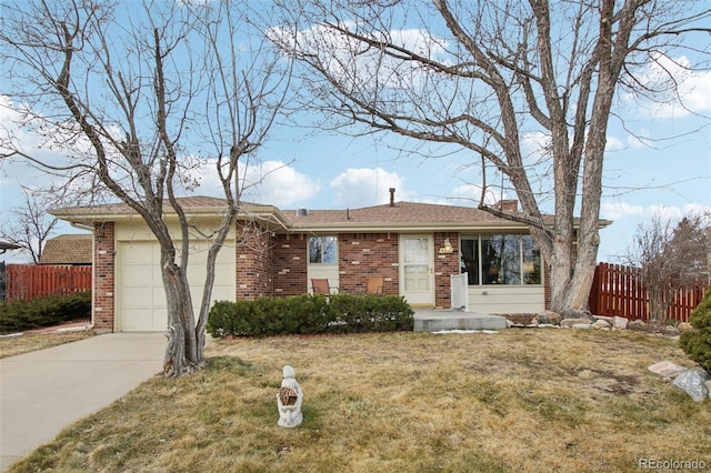 single story home featuring a front yard and a garage