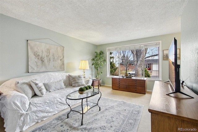 carpeted living room with a textured ceiling