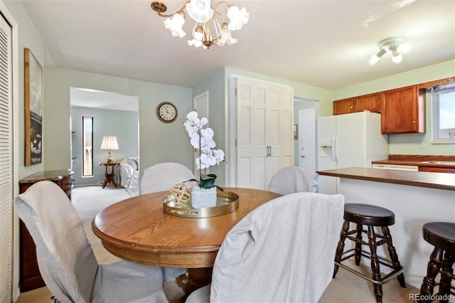 dining room with a chandelier