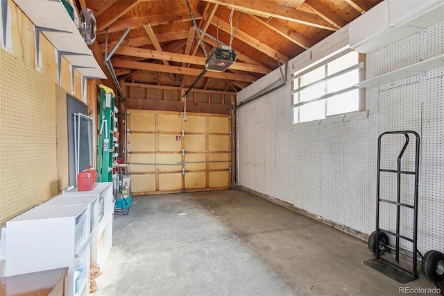 garage featuring a garage door opener