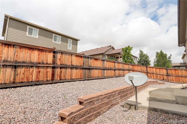 9643 Birch Ln, Thornton, CO 80229 - fenced backyard with a patio area