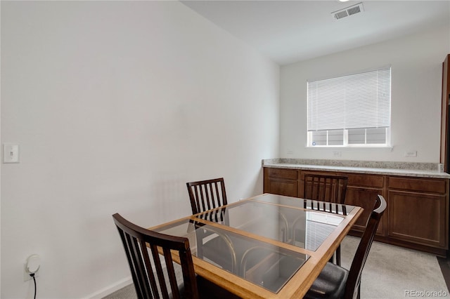 9643 Birch Ln, Thornton, CO 80229 - dining space featuring light colored carpet and baseboards