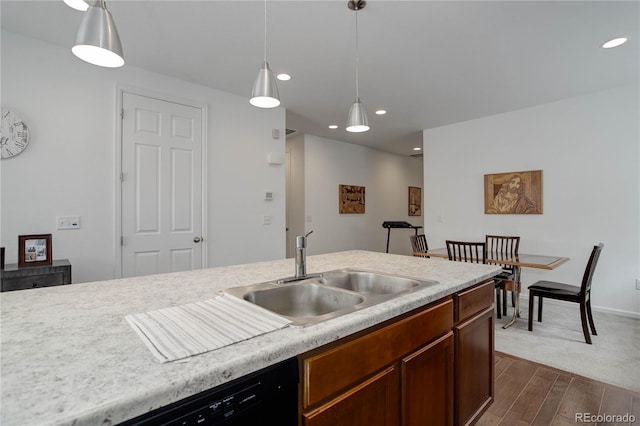 9643 Birch Ln, Thornton, CO 80229 - kitchen featuring a sink, light countertops, dark wood-style flooring, hanging light fixtures, and recessed lighting