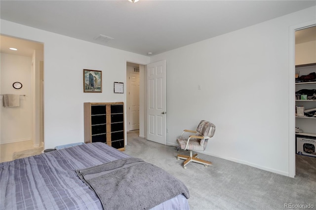 9643 Birch Ln, Thornton, CO 80229 - carpeted bedroom with a walk in closet and baseboards