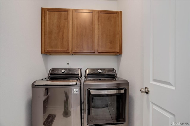 9643 Birch Ln, Thornton, CO 80229 - laundry room featuring independent washer and dryer and cabinet space