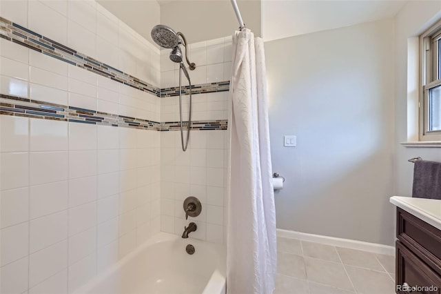 bathroom featuring vanity, tile patterned floors, and shower / bath combination with curtain