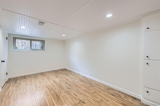 basement featuring light hardwood / wood-style flooring