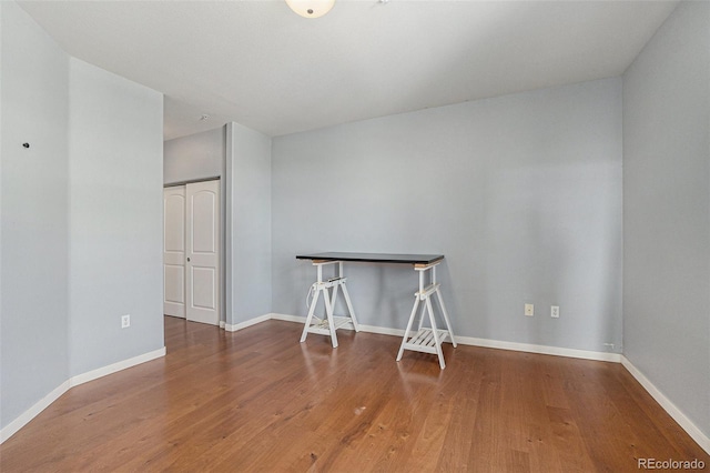 13456 Via Varra Unit 140, Broomfield, CO 80020 - empty room with wood finished floors