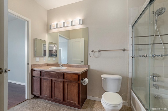 13456 Via Varra Unit 140, Broomfield, CO 80020 - bathroom featuring vanity, shower / bath combination with glass door, and tile patterned flooring