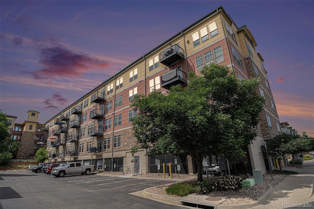 13456 Via Varra Unit 140, Broomfield, CO 80020 - view of apartment building / complex with uncovered parking