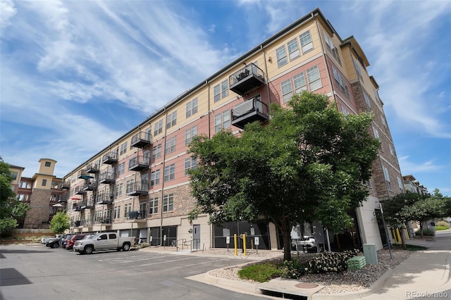 13456 Via Varra Unit 140, Broomfield, CO 80020 - view of apartment building / complex with uncovered parking