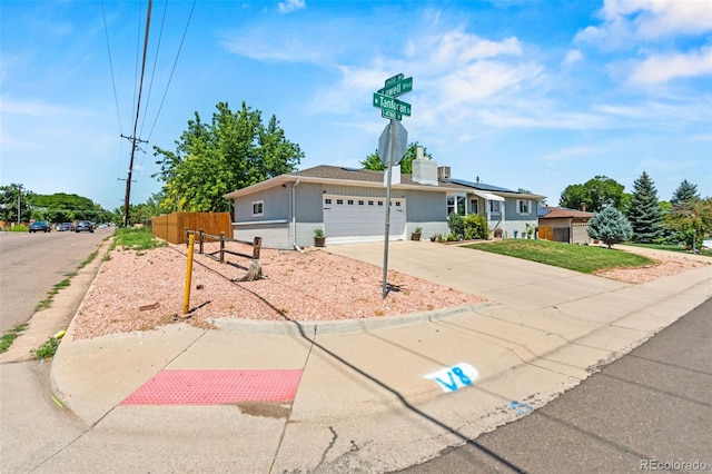 3397 W Tanforan Dr, Englewood, CO 80110 - ranch-style home featuring driveway and an attached garage