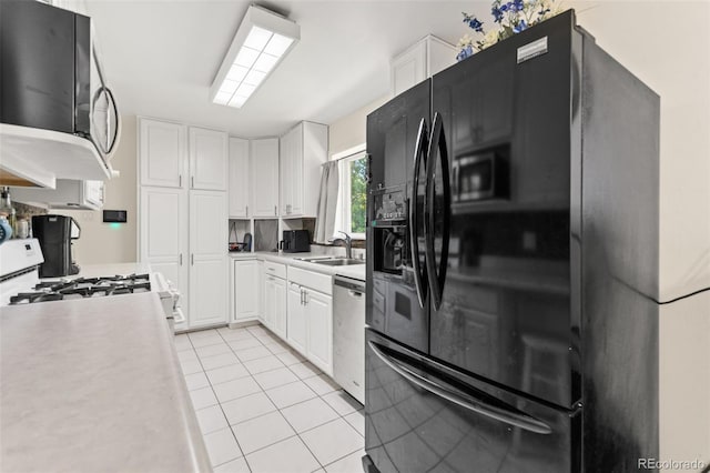 3397 W Tanforan Dr, Englewood, CO 80110 - kitchen with black fridge with ice dispenser, stainless steel dishwasher, light countertops, white cabinets, and light tile patterned flooring