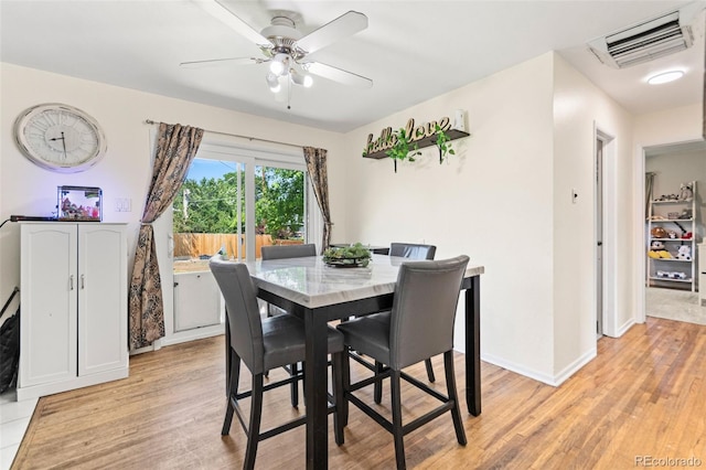 3397 W Tanforan Dr, Englewood, CO 80110 - dining space with light wood-style flooring and ceiling fan