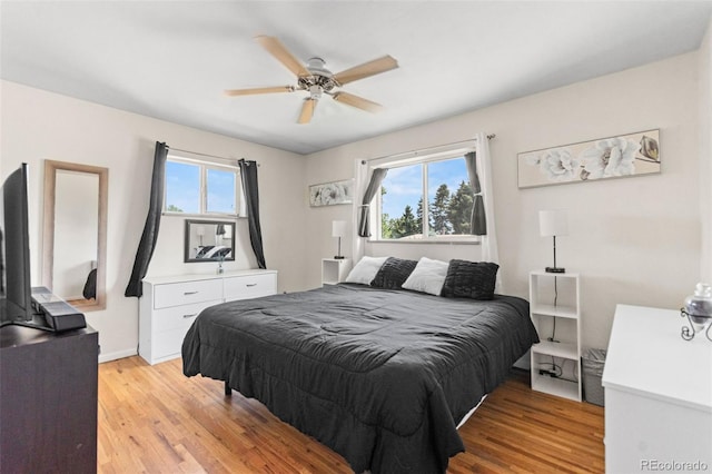 3397 W Tanforan Dr, Englewood, CO 80110 - bedroom featuring light wood-style floors and a ceiling fan