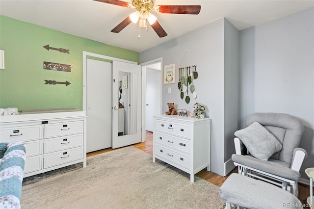 3397 W Tanforan Dr, Englewood, CO 80110 - living area featuring a ceiling fan and light wood-type flooring