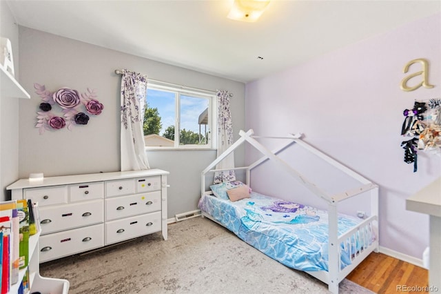 3397 W Tanforan Dr, Englewood, CO 80110 - bedroom featuring baseboards