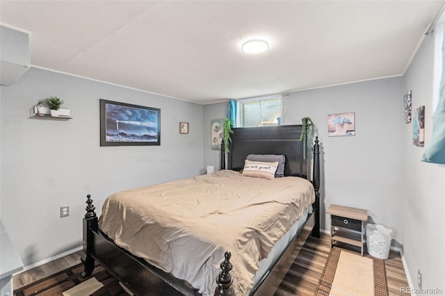 3397 W Tanforan Dr, Englewood, CO 80110 - bedroom featuring wood finished floors and baseboards