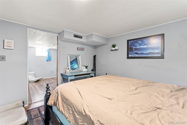 3397 W Tanforan Dr, Englewood, CO 80110 - bedroom with dark wood-type flooring