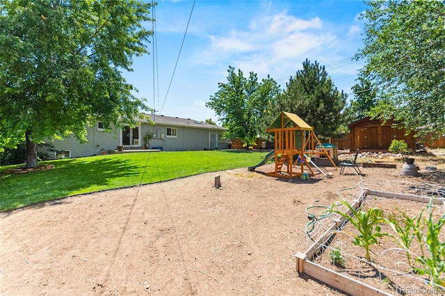 3397 W Tanforan Dr, Englewood, CO 80110 - view of yard featuring a playground