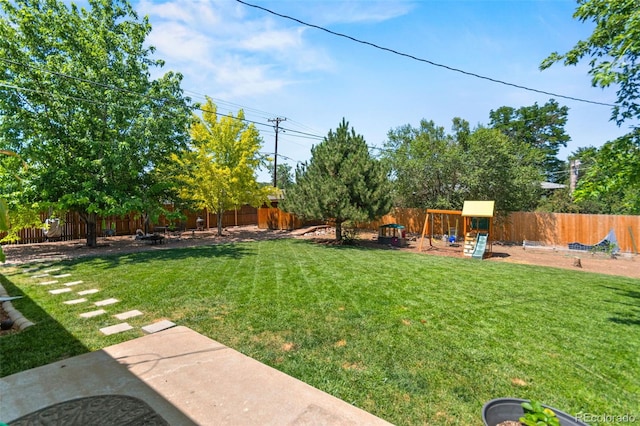 3397 W Tanforan Dr, Englewood, CO 80110 - fenced backyard with a playground