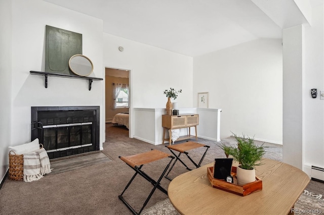 carpeted living room featuring lofted ceiling