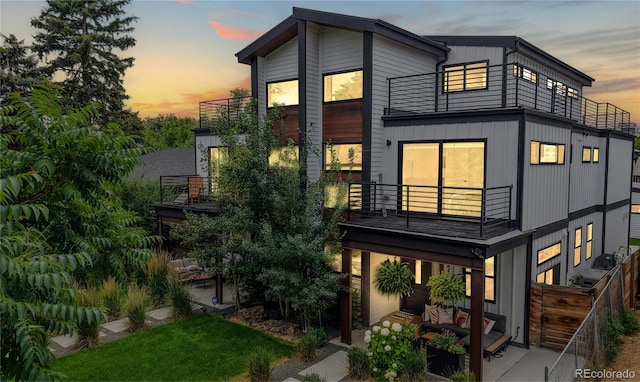 2147 S Sherman St, Denver, CO 80210 - rear view of house featuring a balcony, a patio area, and outdoor lounge area