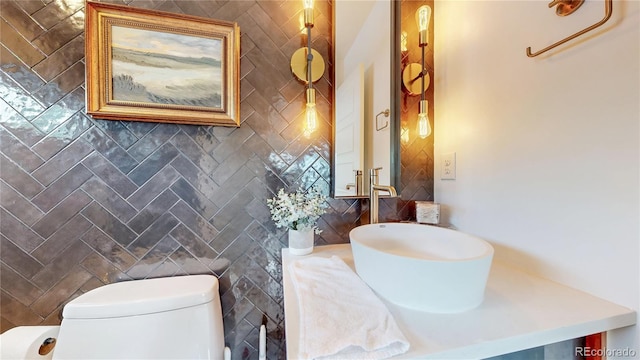 2147 S Sherman St, Denver, CO 80210 - bathroom featuring vanity and tile walls