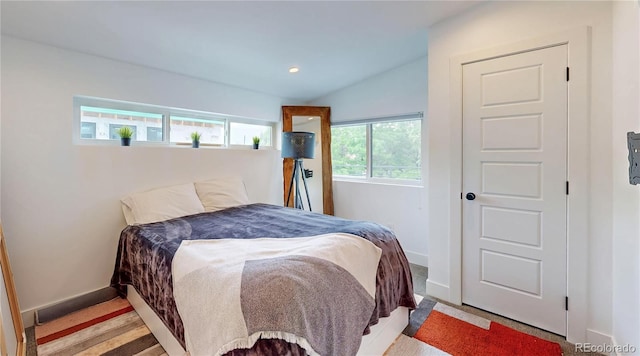 2147 S Sherman St, Denver, CO 80210 - bedroom featuring lofted ceiling and recessed lighting