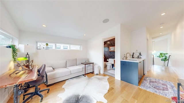 2147 S Sherman St, Denver, CO 80210 - living area with light wood finished floors and recessed lighting