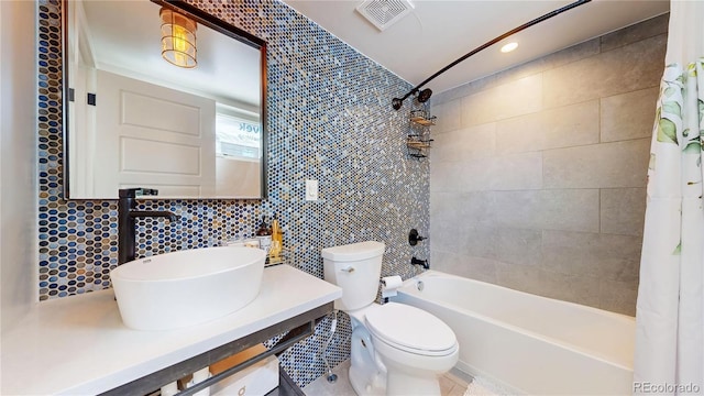 2147 S Sherman St, Denver, CO 80210 - full bathroom featuring shower / bathtub combination with curtain, decorative backsplash, vanity, and tile walls