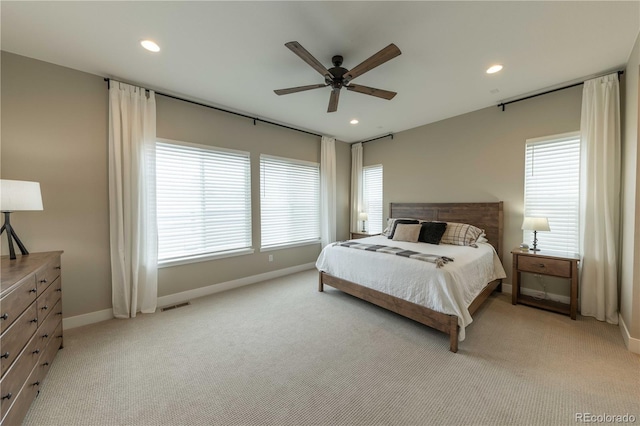 carpeted bedroom with ceiling fan