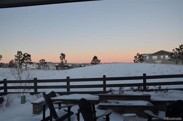 view of snow covered patio